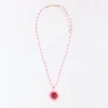 Beaded Necklace with Hibiscus Pendant Beaded Necklace with Hibiscus Pendant