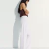 High-Waist Shimmery Straight-Leg Jeans High-Waist Shimmery Straight-Leg Jeans